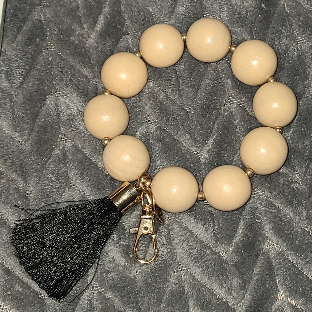 Plunder "Serenity" Beige Beaded Bracelet with Black Tassel